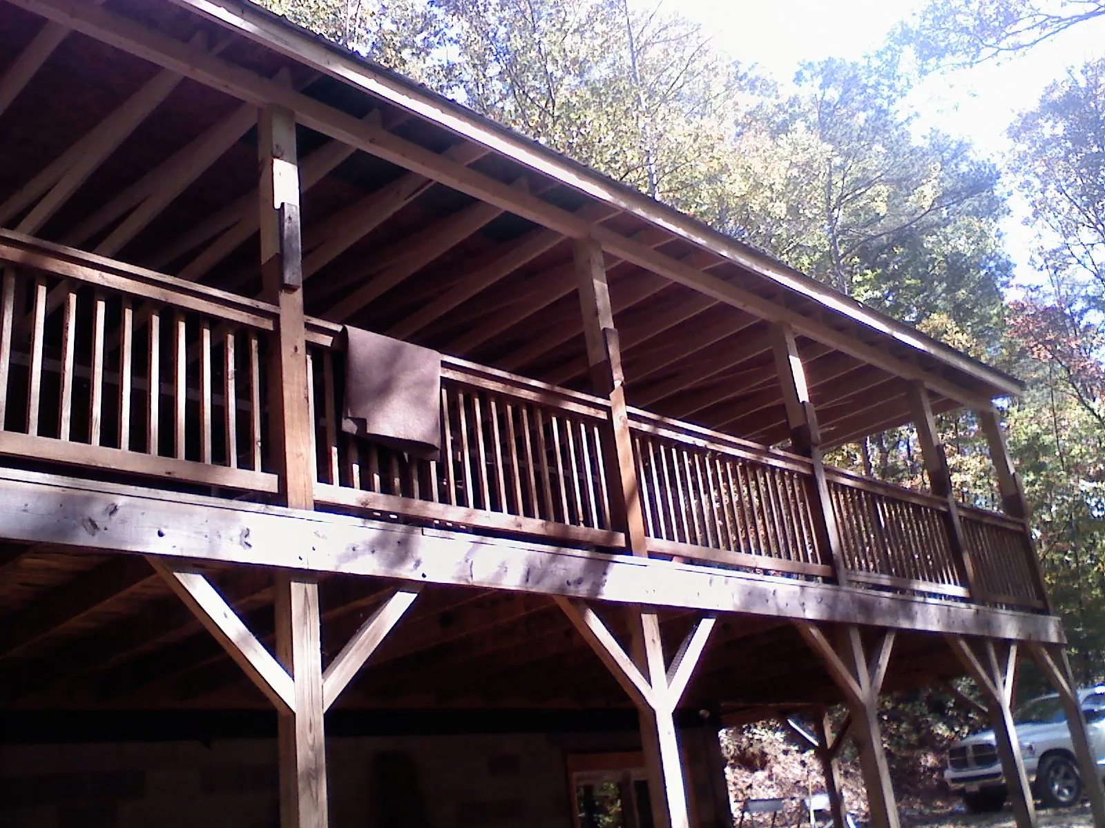 Timber framing under a new elevated porch and deck — Roof Leak Repair in Flanders by Roofing Brothers